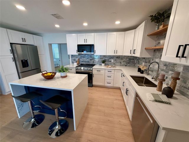 1824 DOUGLAS AVENUE, Dunedin, FL 34698