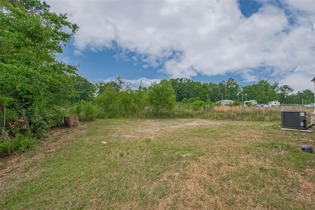 371 County Road 5015, Cleveland, TX 77327