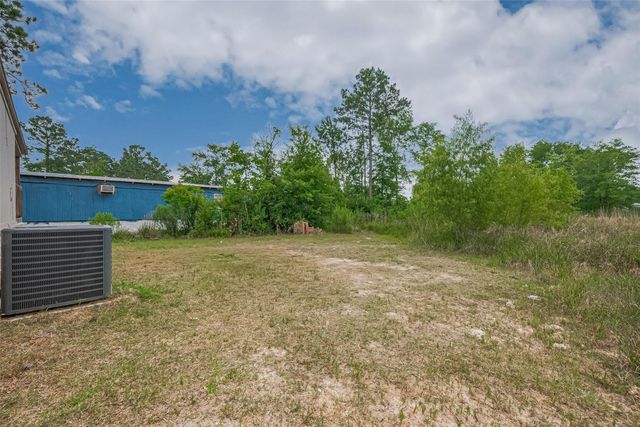 371 County Road 5015, Cleveland, TX 77327