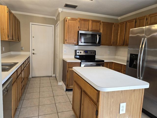 10704 SATINWOOD CIRCLE, Orlando, FL 32825