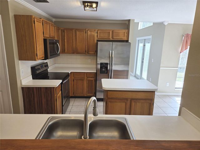 10704 SATINWOOD CIRCLE, Orlando, FL 32825