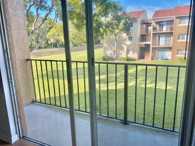 1215 N Benoist Farms Road 203, West Palm Beach, FL 33411