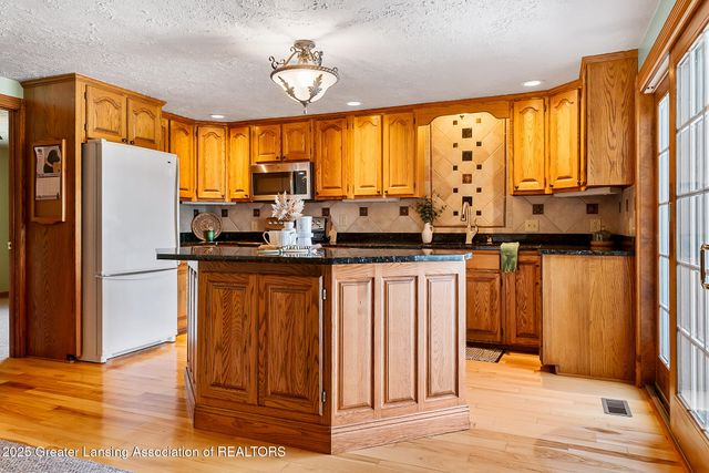 4813 Lakeside Drive, Perrinton, MI 48871