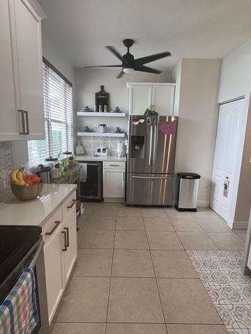 180 Seminole Lakes Drive, Royal Palm Beach, FL 33411