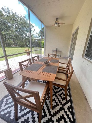 180 Seminole Lakes Drive, Royal Palm Beach, FL 33411