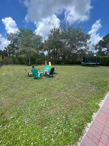 180 Seminole Lakes Drive, Royal Palm Beach, FL 33411