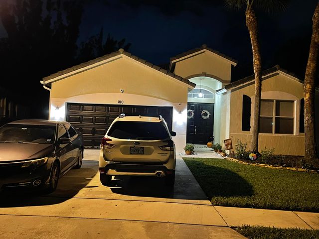 180 Seminole Lakes Drive, Royal Palm Beach, FL 33411