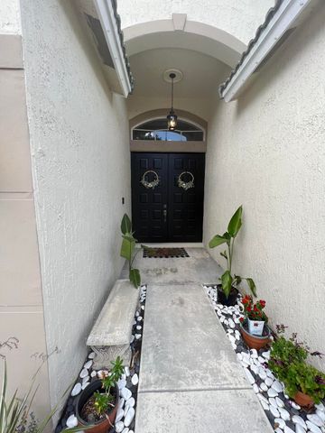 180 Seminole Lakes Drive, Royal Palm Beach, FL 33411