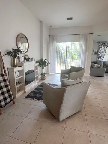 180 Seminole Lakes Drive, Royal Palm Beach, FL 33411