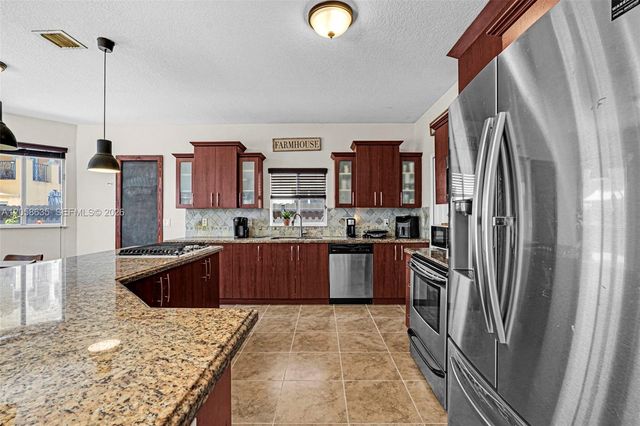 15664 SW 12th Ter, Miami, FL 33194