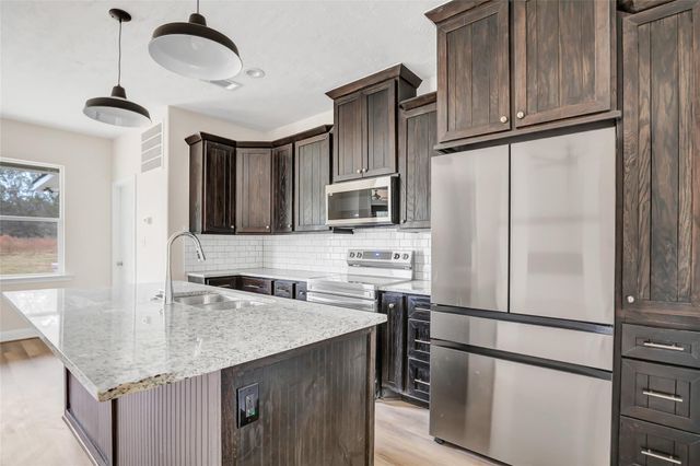 25154 Blackburn Drive, Splendora, TX 77372