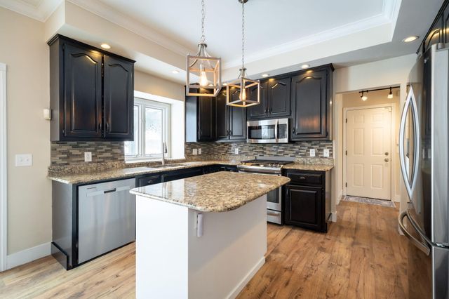 1367 Meadow Green Court SE, Caledonia, MI 49316