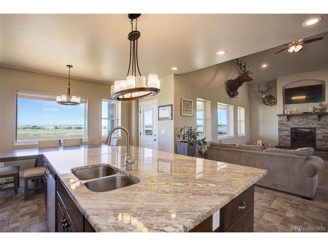 45425 Wolf Creek Dr, Bennett, CO 80102