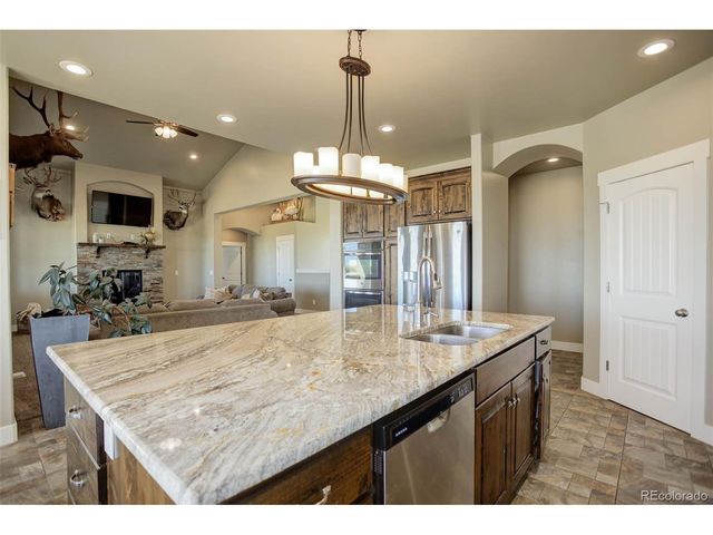45425 Wolf Creek Dr, Bennett, CO 80102