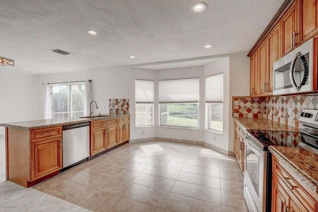 10758 Lake Jasmine Drive, Boca Raton, FL 33498