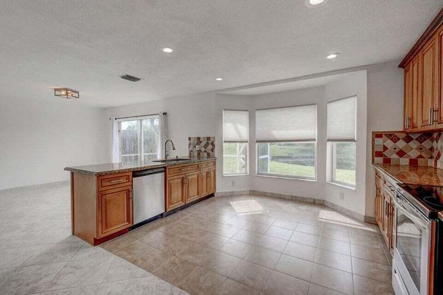 10758 Lake Jasmine Drive, Boca Raton, FL 33498