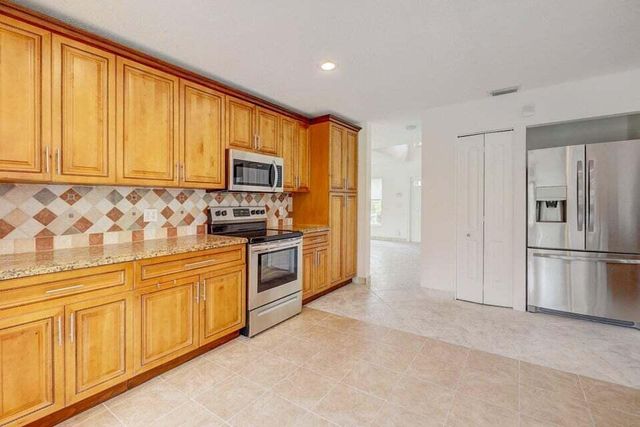 10758 Lake Jasmine Drive, Boca Raton, FL 33498