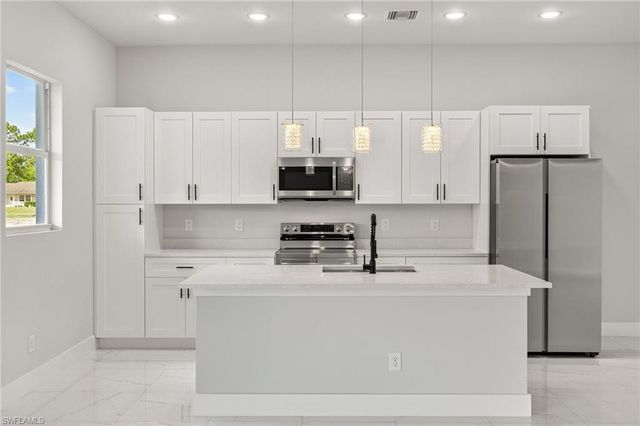 525 Genesee AVE S, Lehigh Acres, FL 33974