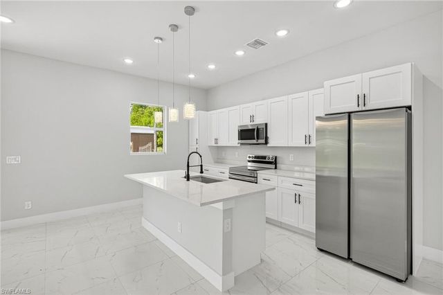 525 Genesee AVE S, Lehigh Acres, FL 33974