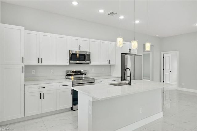 525 Genesee AVE S, Lehigh Acres, FL 33974