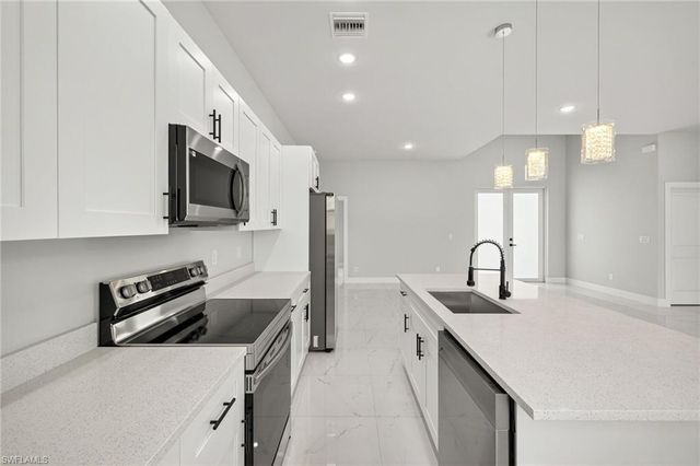 525 Genesee AVE S, Lehigh Acres, FL 33974