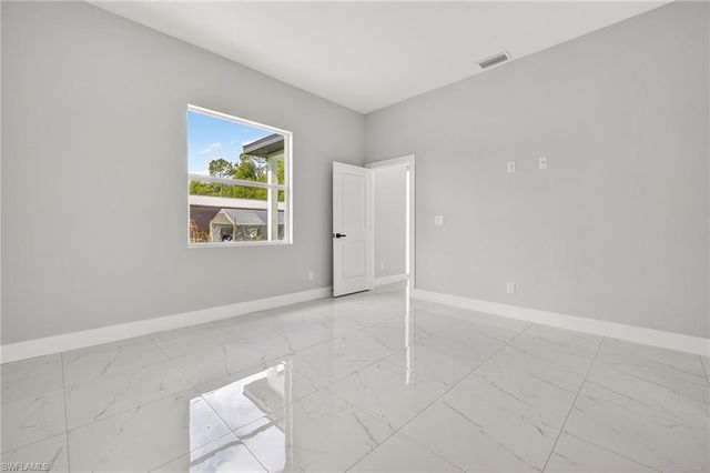525 Genesee AVE S, Lehigh Acres, FL 33974