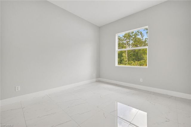 525 Genesee AVE S, Lehigh Acres, FL 33974