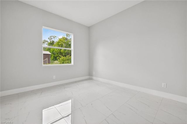 525 Genesee AVE S, Lehigh Acres, FL 33974