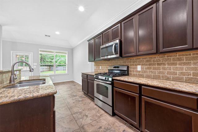 3 Black Swan Court, Magnolia, TX 77354
