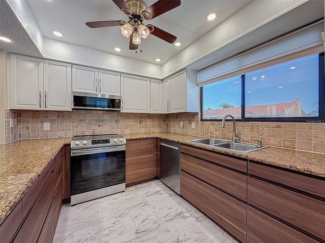 9981 EAGLES POINT CIRCLE 4, Port Richey, FL 34668