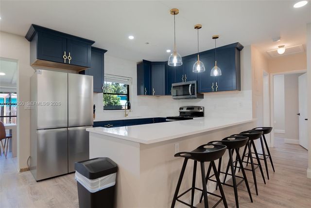 712 Tradewind Dr, North Palm Beach, FL 33408
