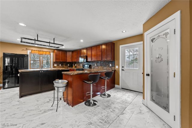 10121 Crows Nest Cove, Aurora, OH 44202