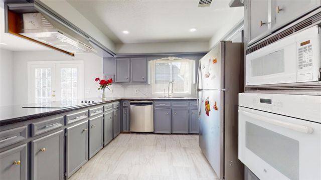 14715 Woodward Gardens Drive, Houston, TX 77082