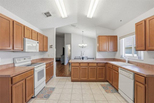 4084 CAPLAND AVENUE, Clermont, FL 34711