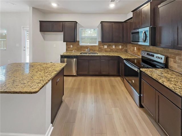 11911 Lovejoy Crossing Way, Hampton, GA 30228