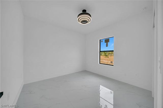 704 Holmes AVE, Lehigh Acres, FL 33974