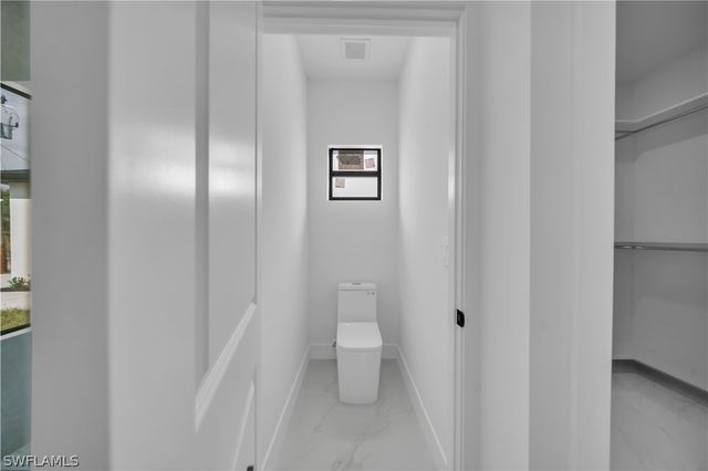 704 Holmes AVE, Lehigh Acres, FL 33974