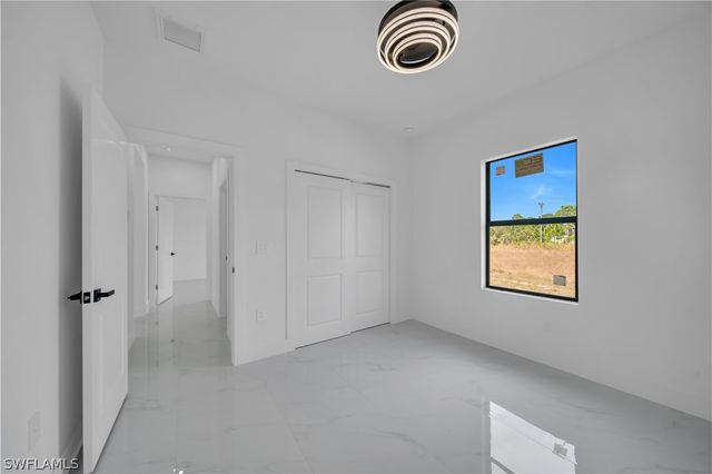 704 Holmes AVE, Lehigh Acres, FL 33974