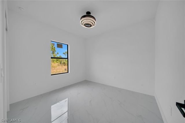 704 Holmes AVE, Lehigh Acres, FL 33974