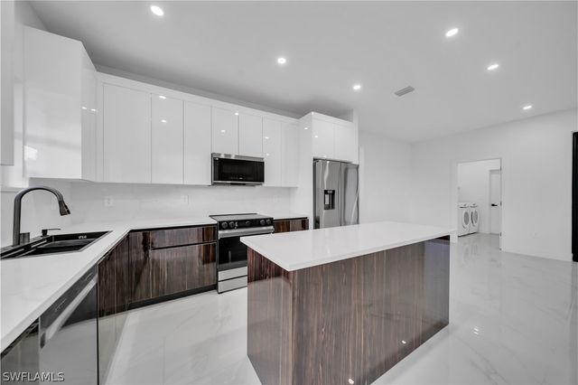 704 Holmes AVE, Lehigh Acres, FL 33974