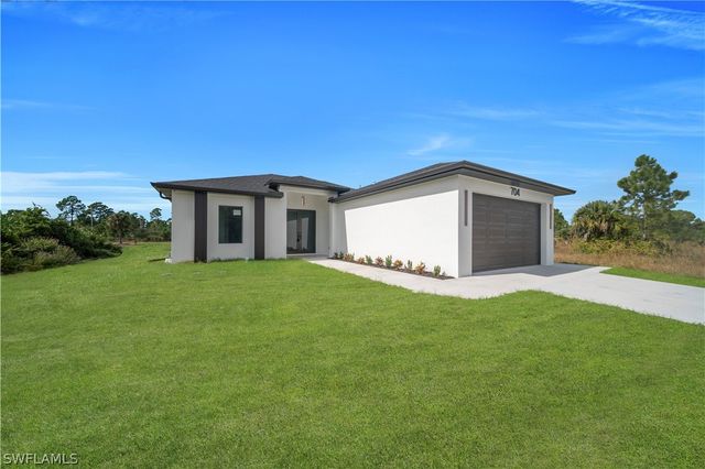 704 Holmes AVE, Lehigh Acres, FL 33974