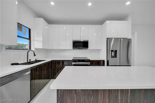 704 Holmes AVE, Lehigh Acres, FL 33974