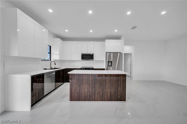 704 Holmes AVE, Lehigh Acres, FL 33974