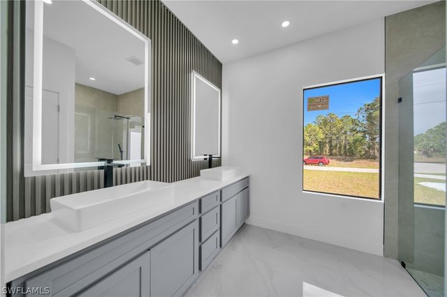 704 Holmes AVE, Lehigh Acres, FL 33974