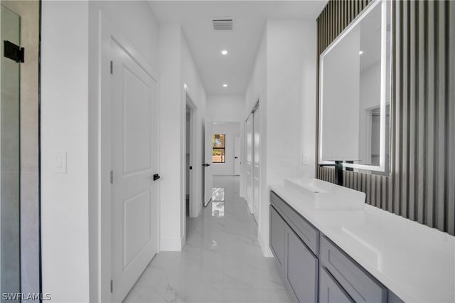 704 Holmes AVE, Lehigh Acres, FL 33974