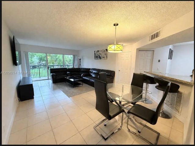 8741 Wiles Road 204, Coral Springs, FL 33067