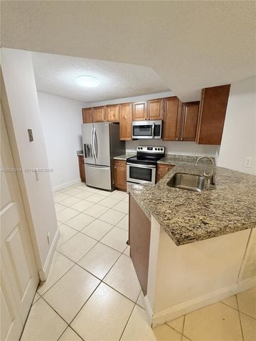 8741 Wiles Road 204, Coral Springs, FL 33067