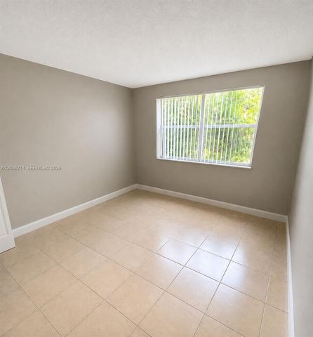 8741 Wiles Road 204, Coral Springs, FL 33067