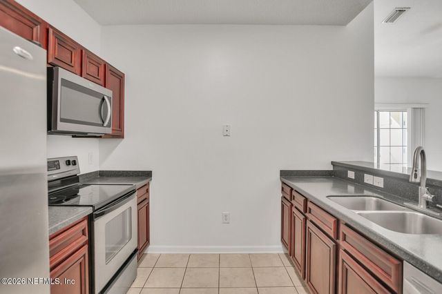 8227 LOBSTER BAY Court 303, Jacksonville, FL 32256