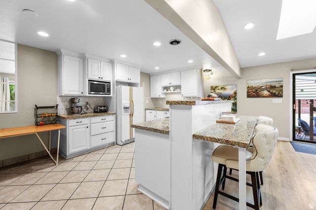 9505 S GARNET DR, Sandy, UT 84094